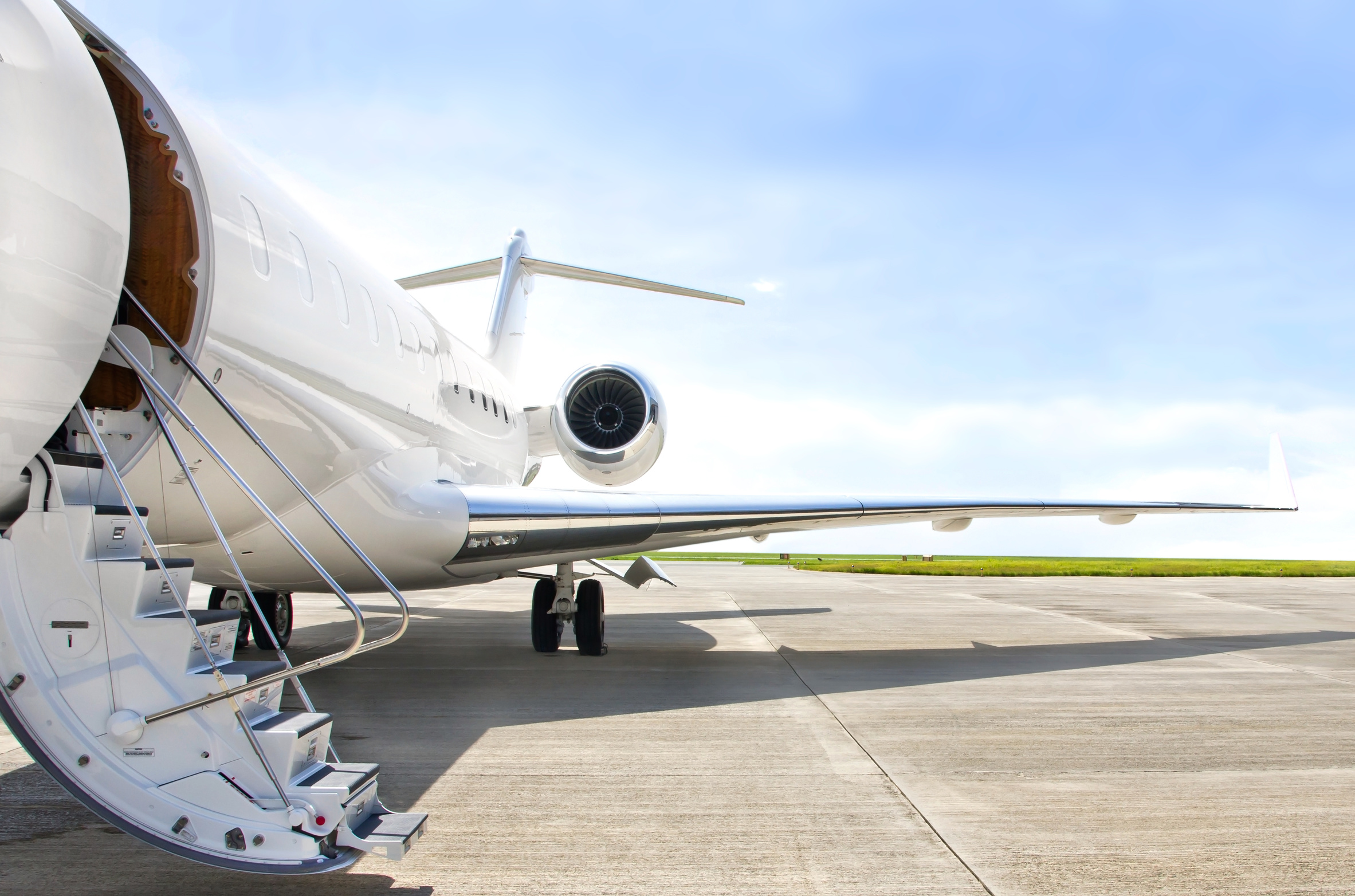 Stairs with jet engine on a private airplane - Bombardier
