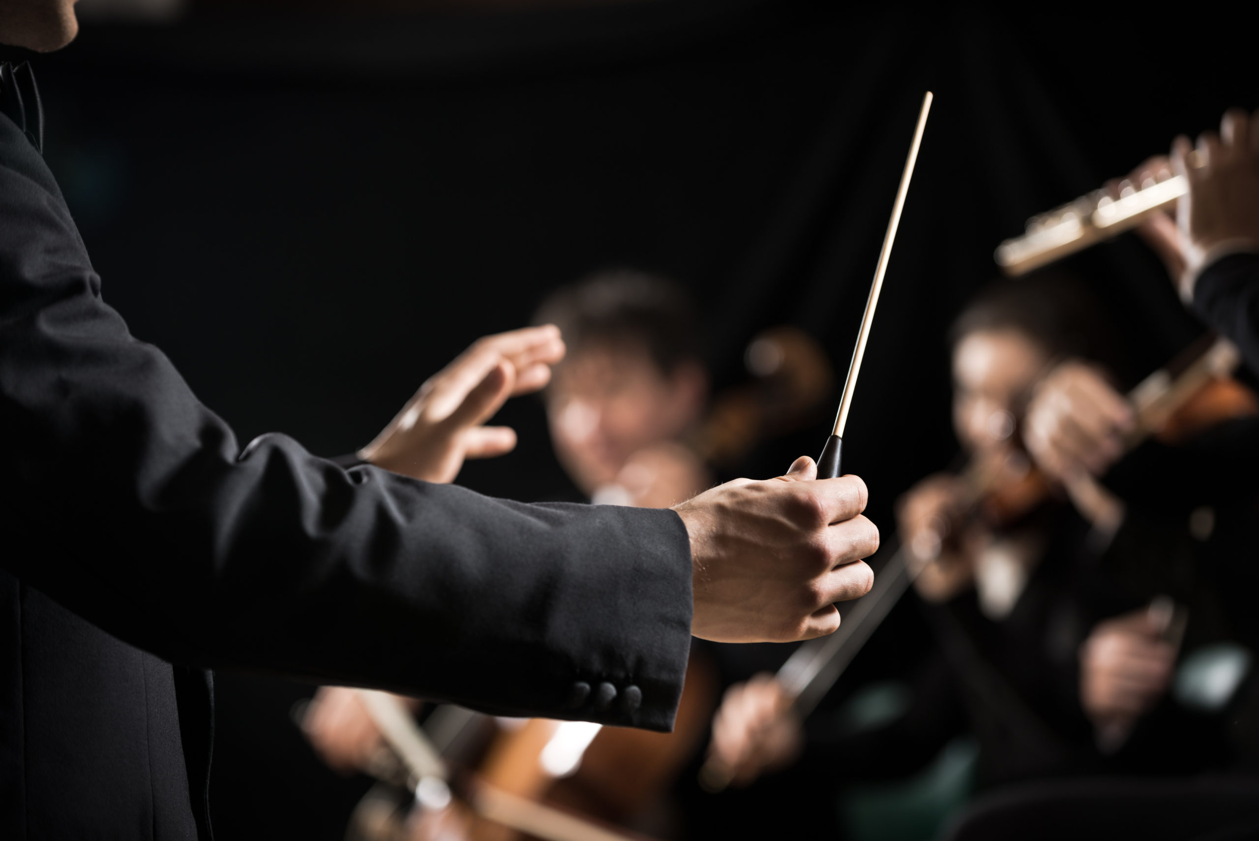 Orchestra conductor on stage