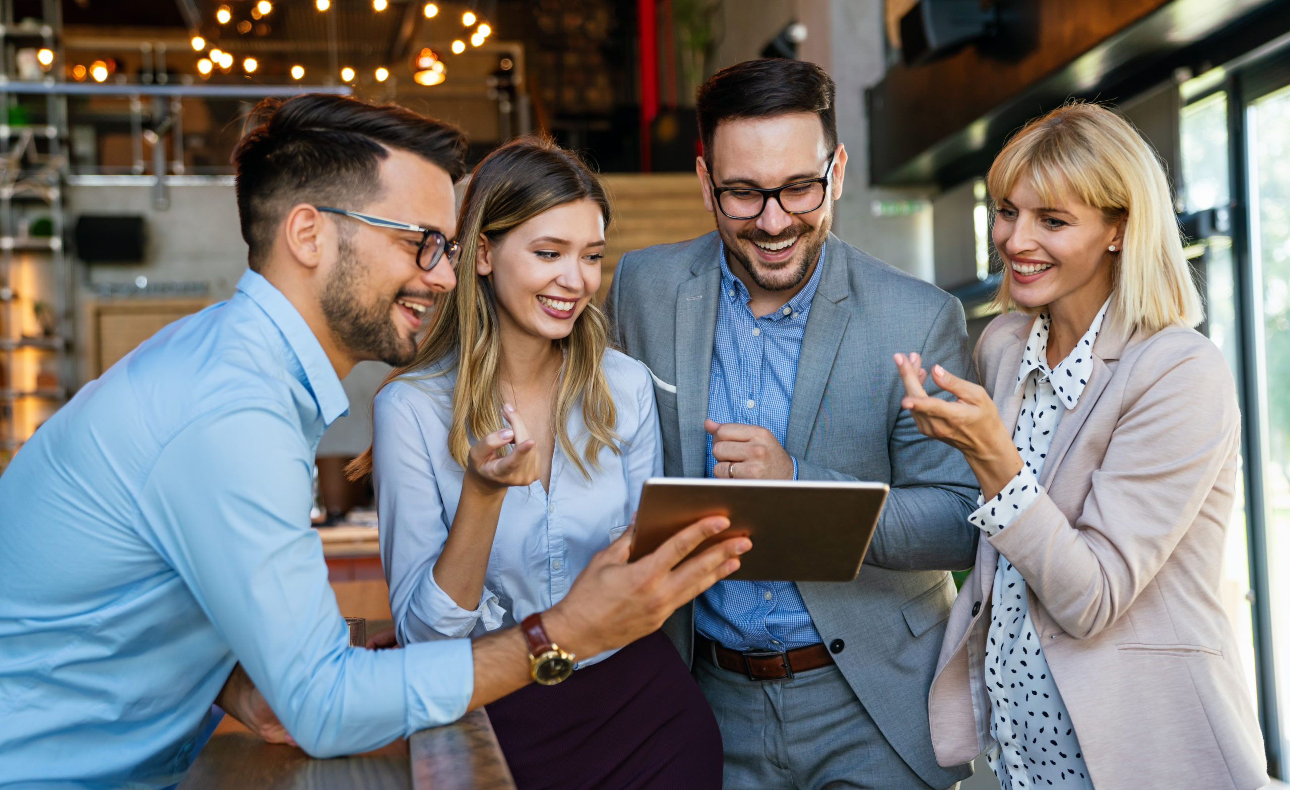 Business people having fun and chatting at workplace office